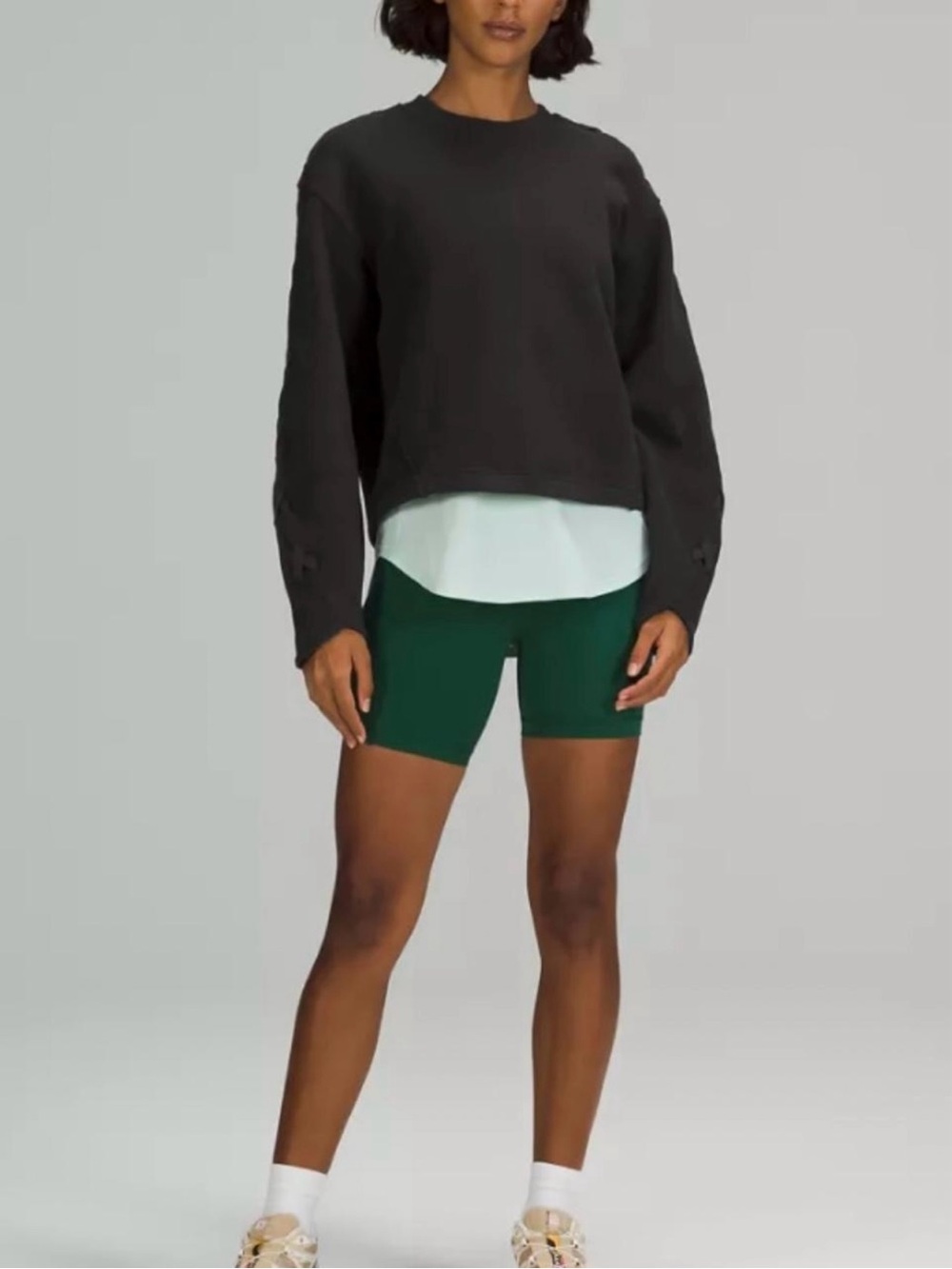 Lululemon Braided Sleeve Pullover in black, size 4.